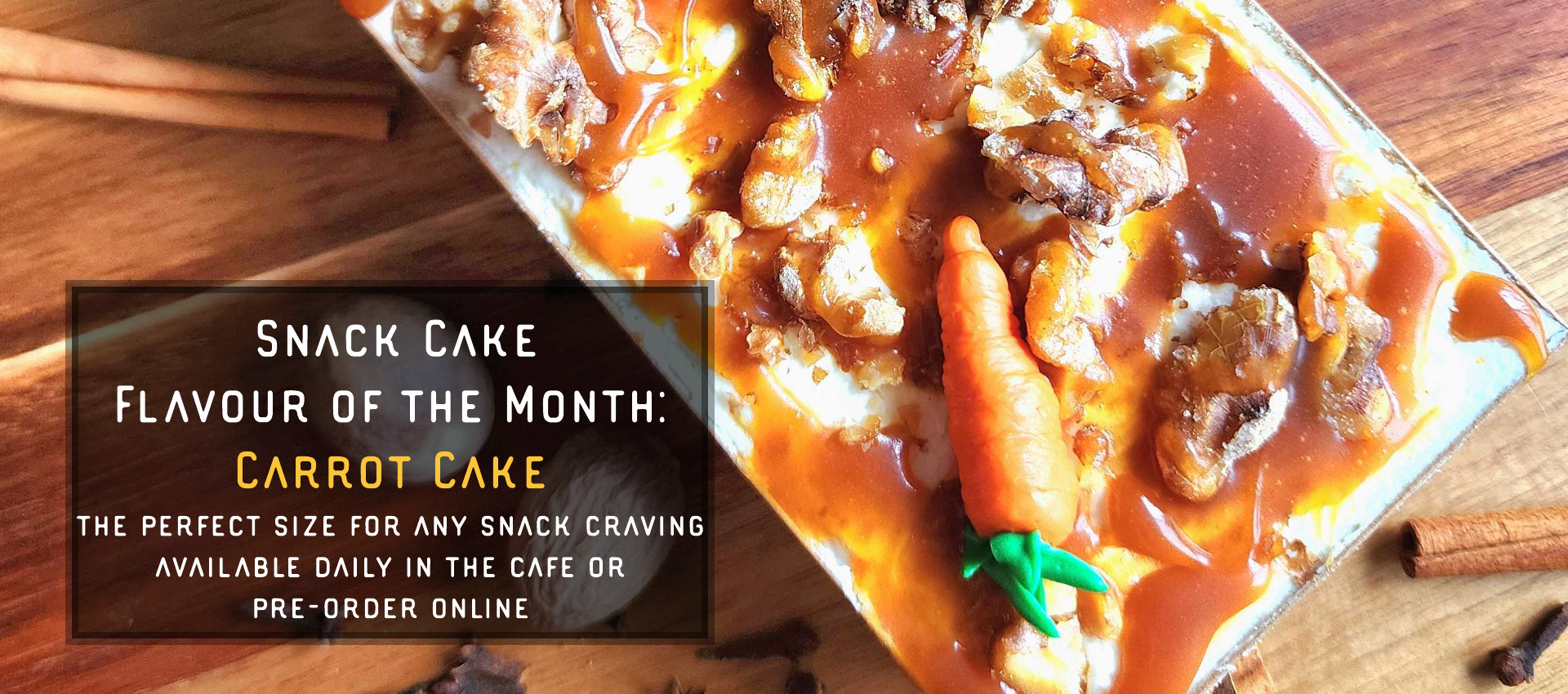 Snack Cake of the Month: Carrot Cake is shown with drizzled caramel, toasted walnut topped cream cheese buttercream.